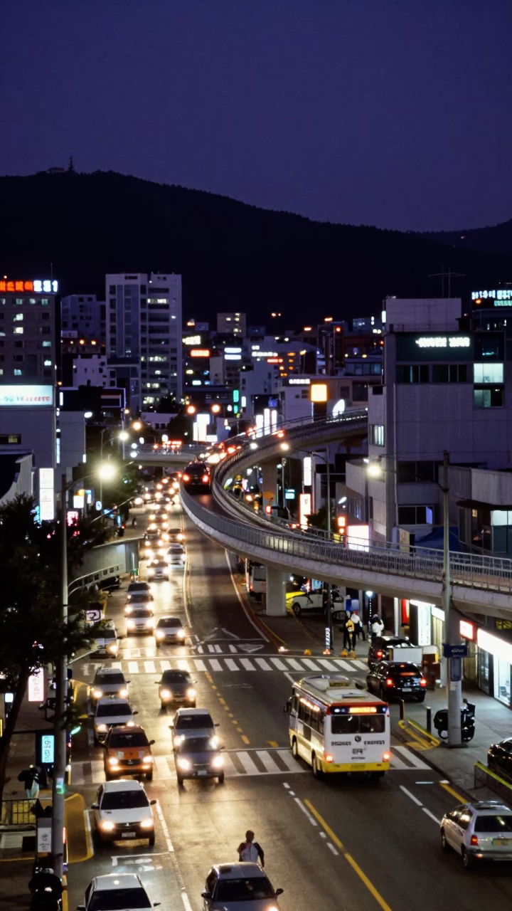 Late Night Busan Street Scene with Overpass Ramp and Neon Reflections in in Busan, South Korea