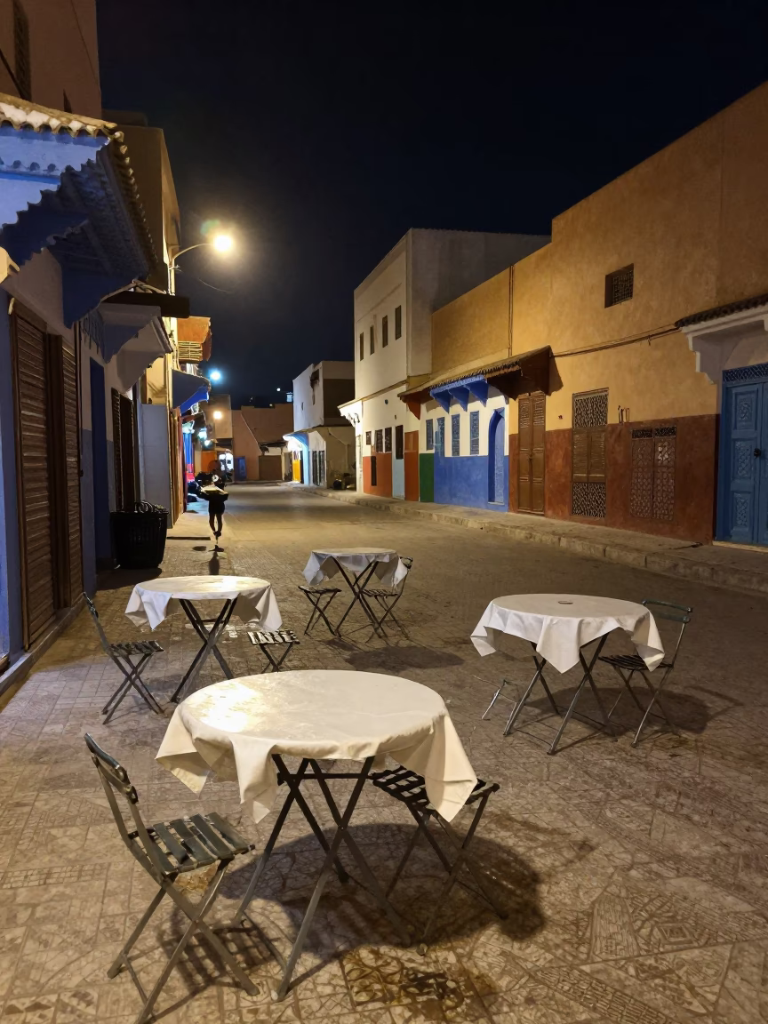 Late Night Casablanca Street Scene with Folding Tables and Doormat in in Casablanca, Morocco