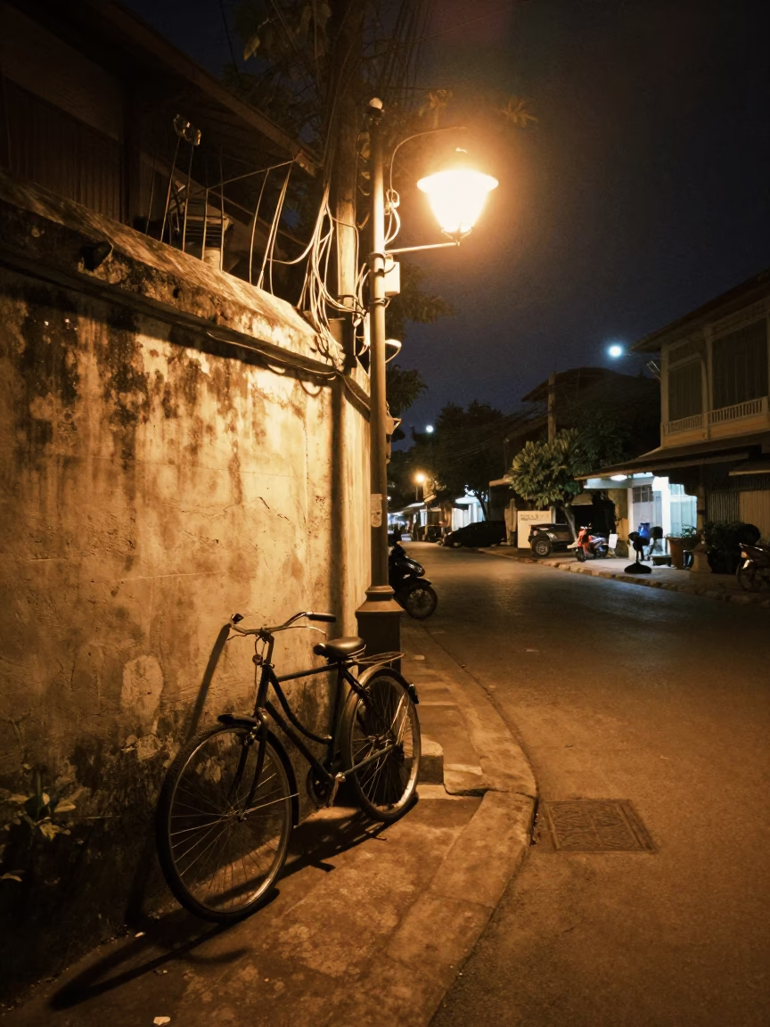 Late Night Chiang Mai Street Scene with Vintage Bicycle and Lantern Light in in Chiang Mai, Thailand