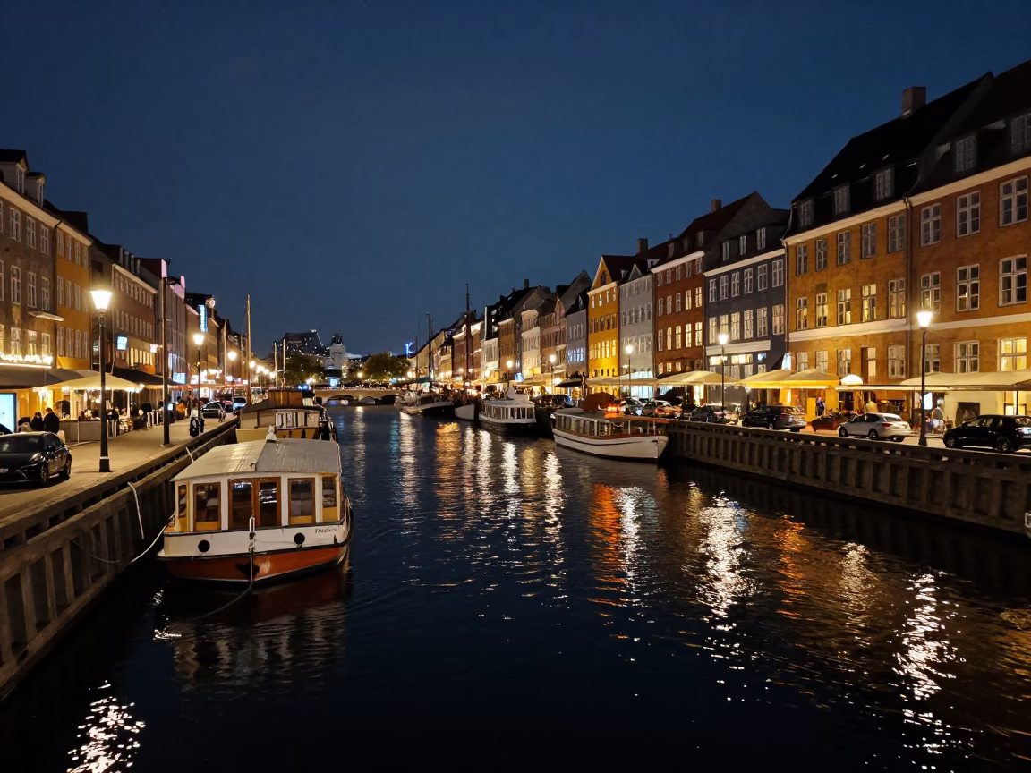Late Night Copenhagen Canal Scene with Water Taxi and Houseboats in in Copenhagen, Denmark