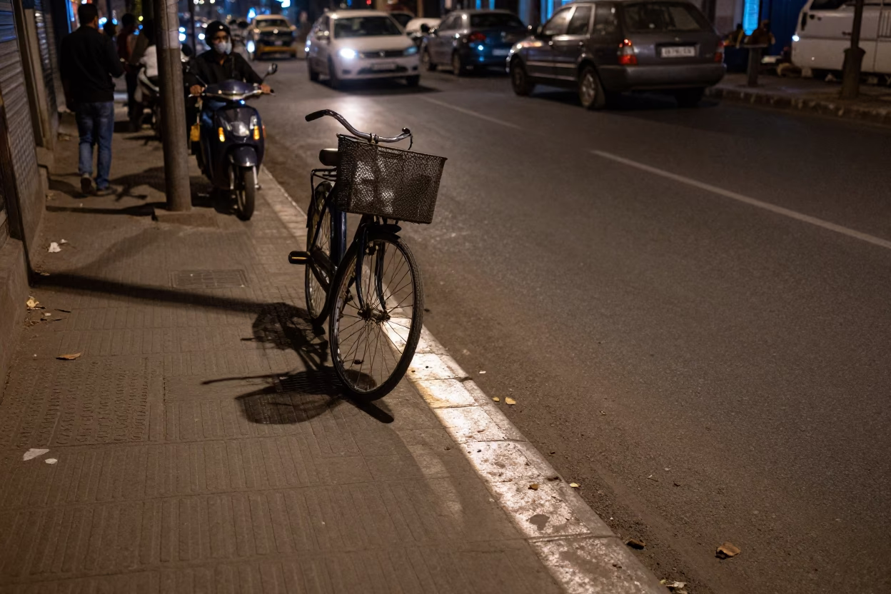 Late Night Delhi Street Scene with Bicycle Basket and Drain Light in in Delhi, India