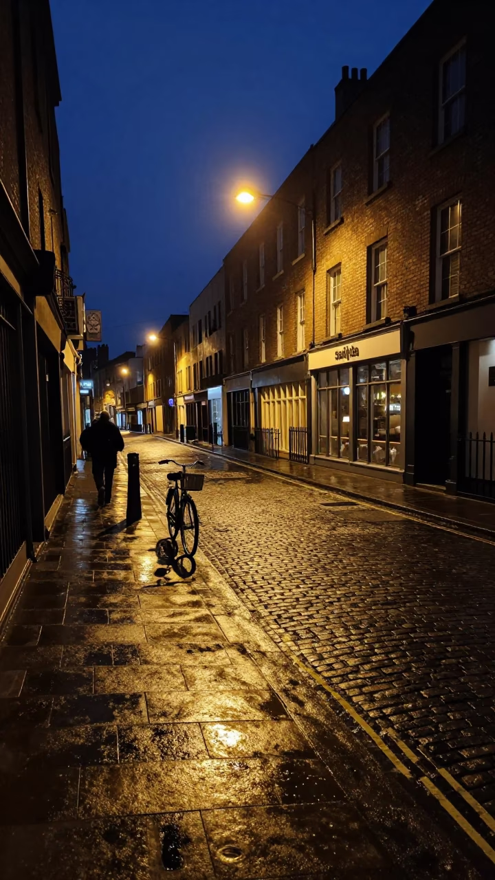 Late Night Dublin Street Scene with Vintage Bicycle and Glass Stool Detail in in Dublin, Ireland