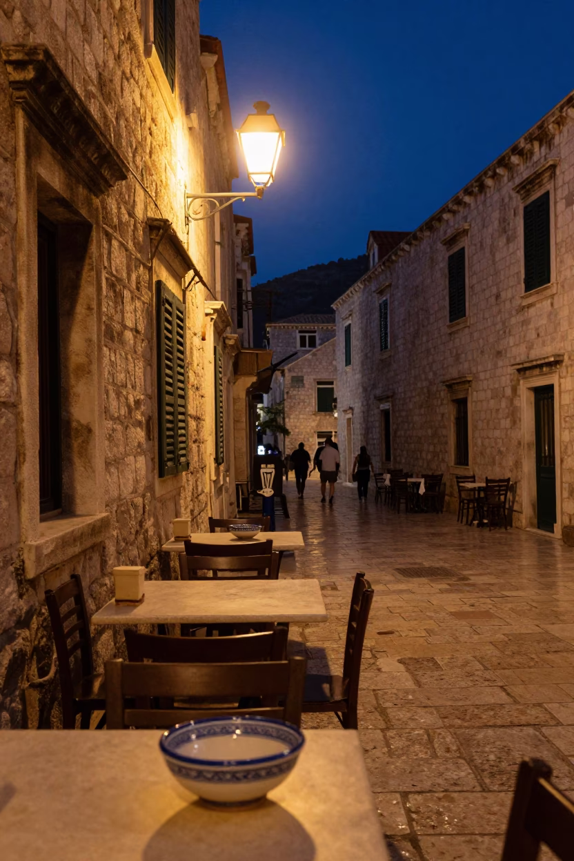 Late Night Dubrovnik Street Scene with Ceramic Bowl and Brass Details in in Dubrovnik, Croatia