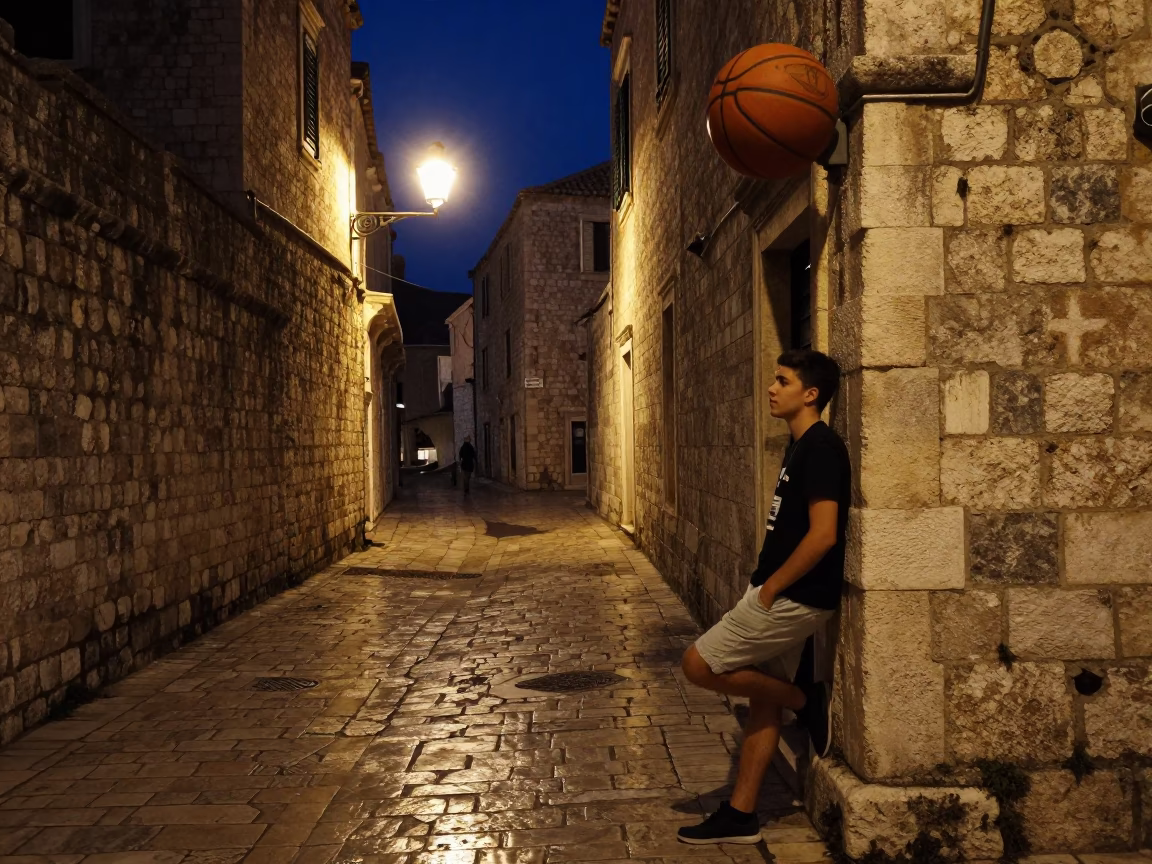 Late Night Dubrovnik Street Scene with Old Leather Basketball and Stone Architecture in in Dubrovnik, Croatia