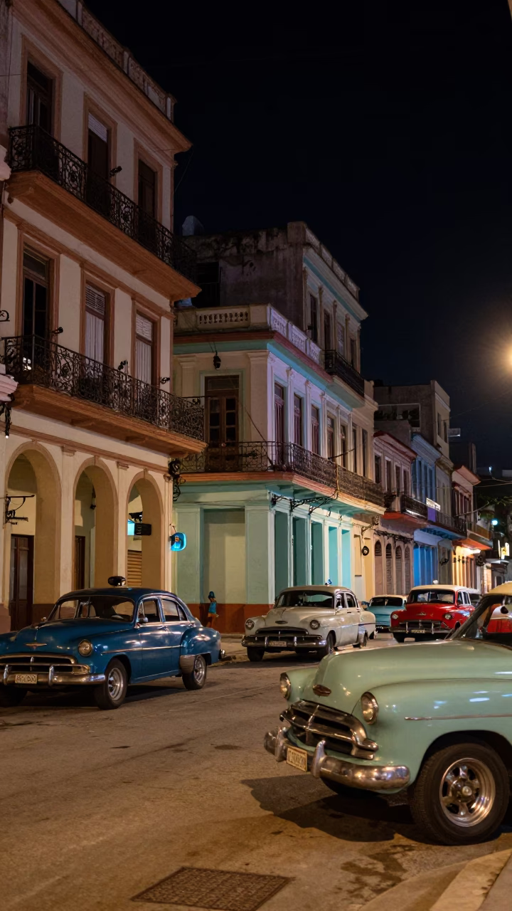 Late Night Havana Street Scene with Vintage Cars and Neon Signs in in Havana, Cuba