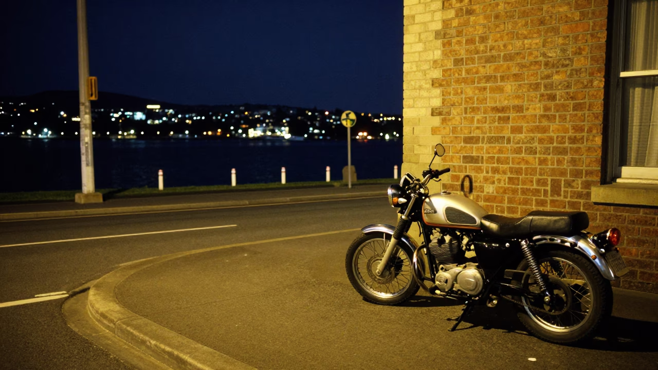Late Night Hobart Street Scene with Vintage Motorcycle and Distant Observatory Dome in in Hobart, Tasmania, Australia