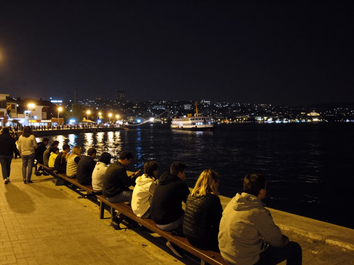 Late Night Izmir Street Scene with Chain Ferry Crossing Kordon Bay Under Night Sky in in Izmir, Turkey