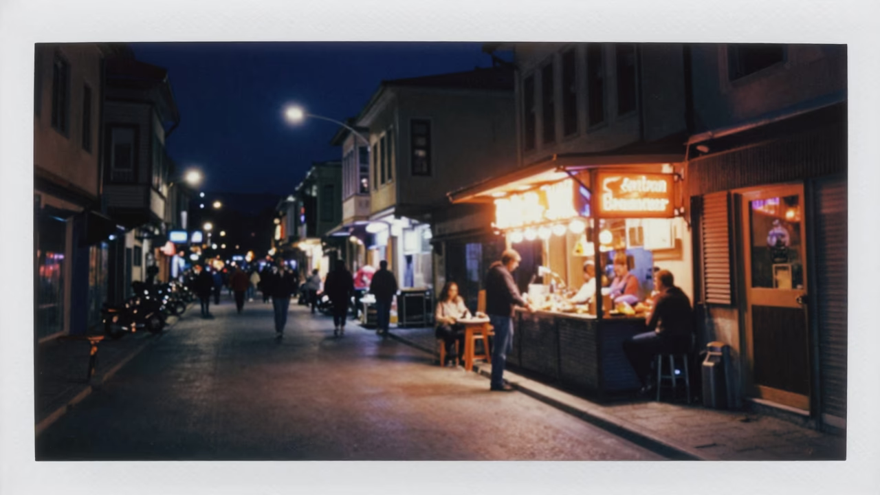 Late Night Izmir Street Scene With Neon Lights And Local Diners in in Izmir, Turkey