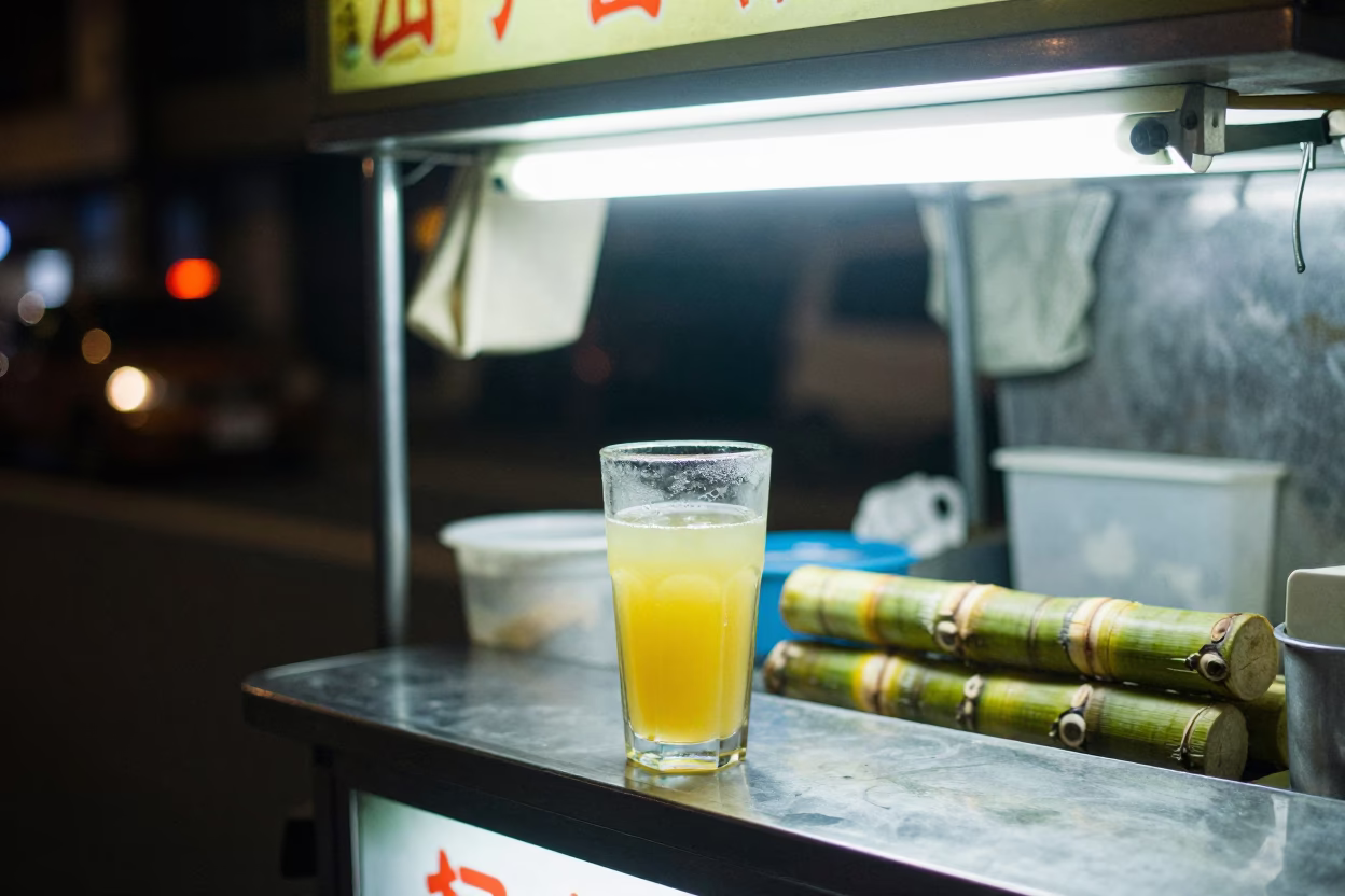 Late Night Kaohsiung Street Scene with Sugarcane Juice and Concrete Infrastructure in in Kaohsiung, Taiwan