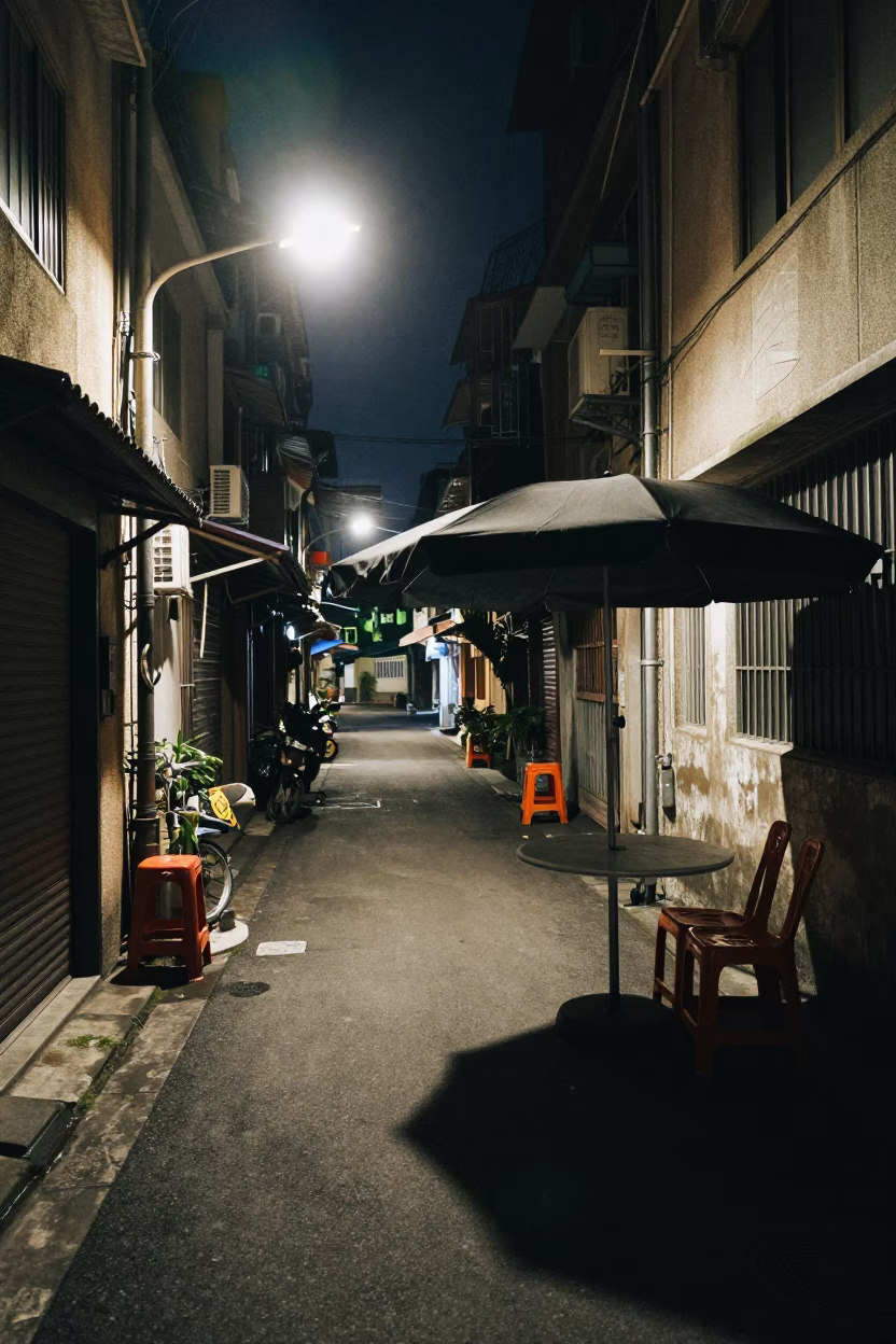 Late Night Kaohsiung Street Scene with Umbrella Stand and Insulation Materials in in Kaohsiung, Taiwan