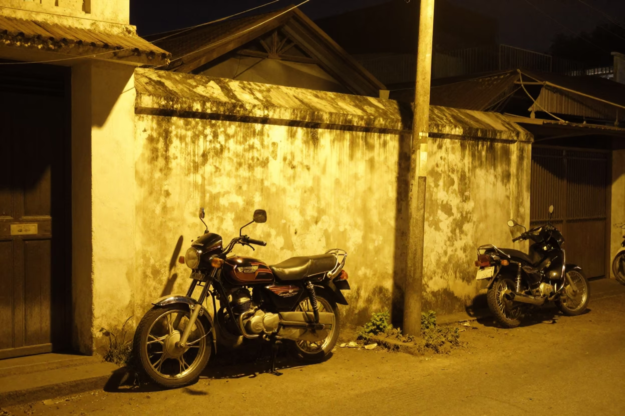 Late Night Kochi Street Scene with Motorcycle and Local Nightlife Elements in in Kochi, India