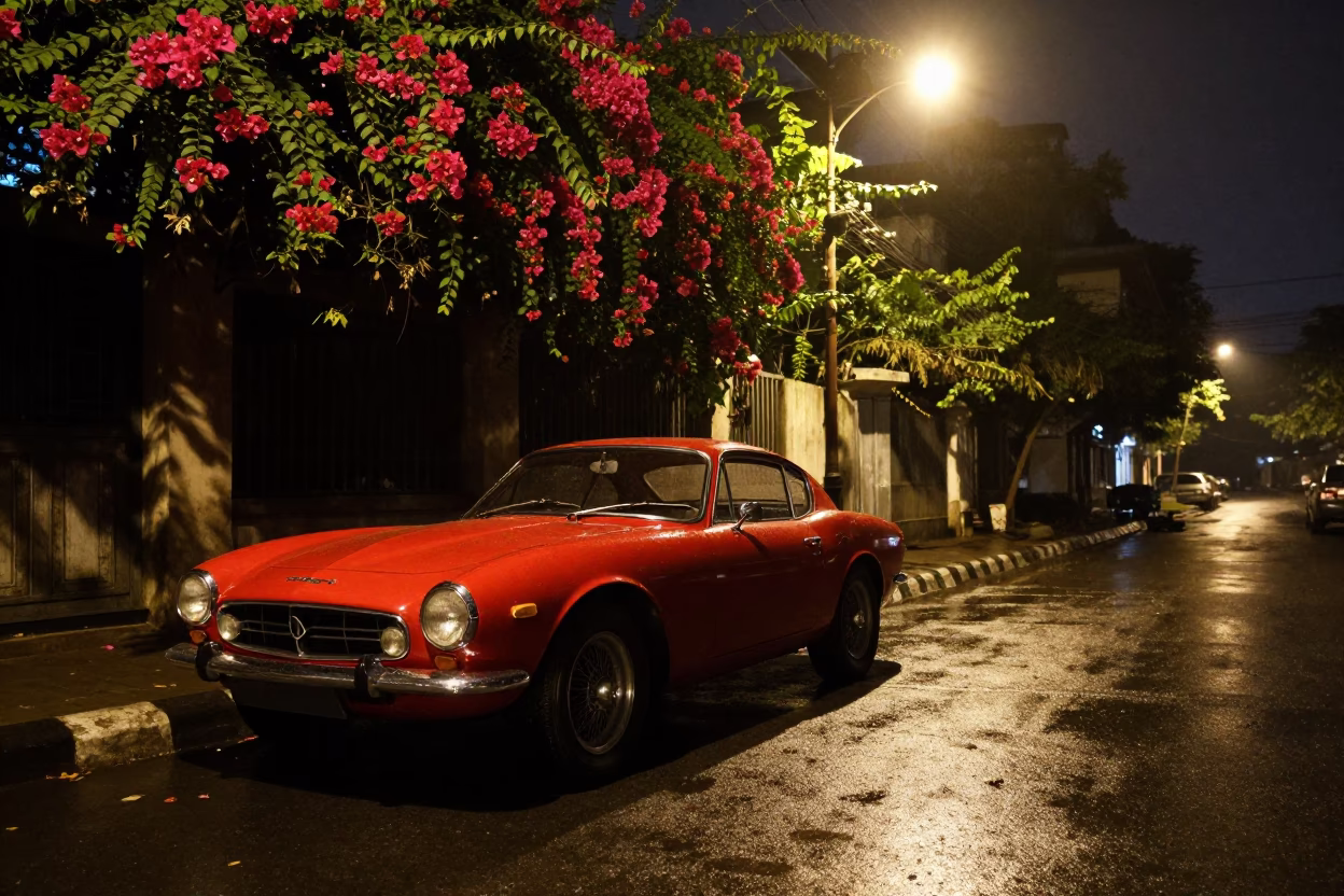 Late Night Kolkata Street Scene with Bougainvillea and Vintage Red Sports Car in in Kolkata, India
