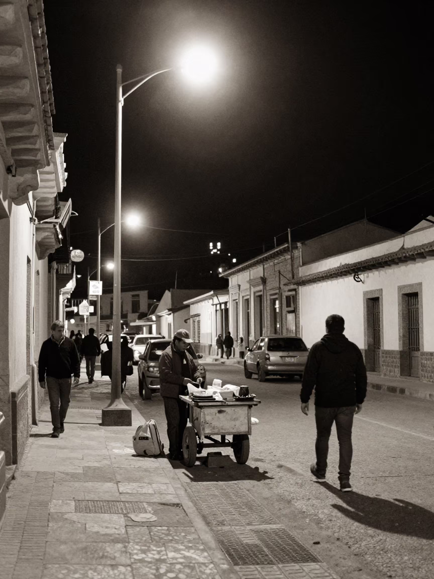 Late Night La Paz Bolivia Street Scene with Vendor and Pedestrian Overpass in in La Paz, Bolivia