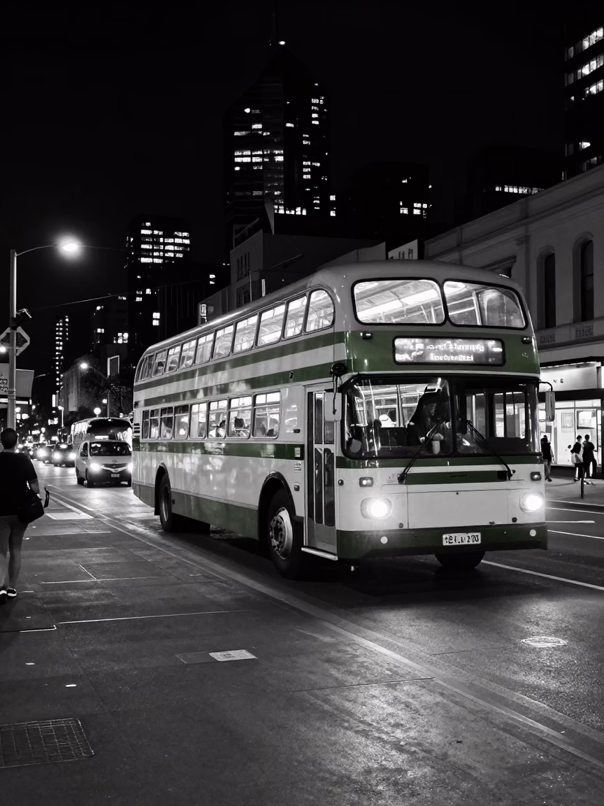Late Night Melbourne Street Scene with Vintage Bus and Neon Signage in in Melbourne, Victoria, Australia
