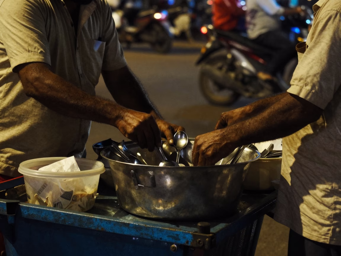 Late Night Mumbai Street Scene with Utensil Crock and Fresh Citrus Peel in in Mumbai, India