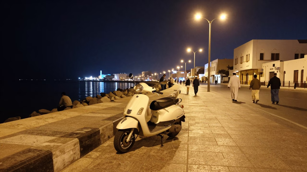 Late Night Muscat Street Scene with Scooter and Traditional Architecture in in Muscat, Oman