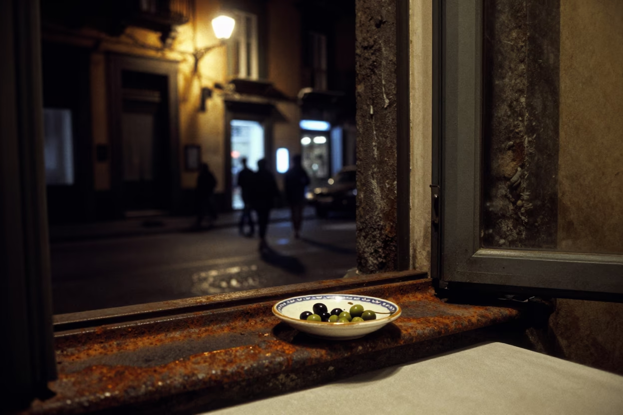 Late Night Naples Street Scene with Rusty Window Sill and Olive Dish Reflection in in Naples, Italy