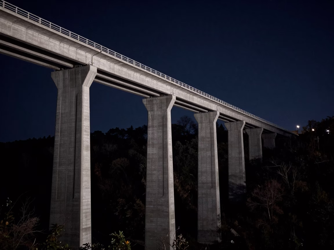 Late Night Nashville Concrete Viaduct Over Valley Floor with Distant City Lights in in Nashville, Tennessee, United States