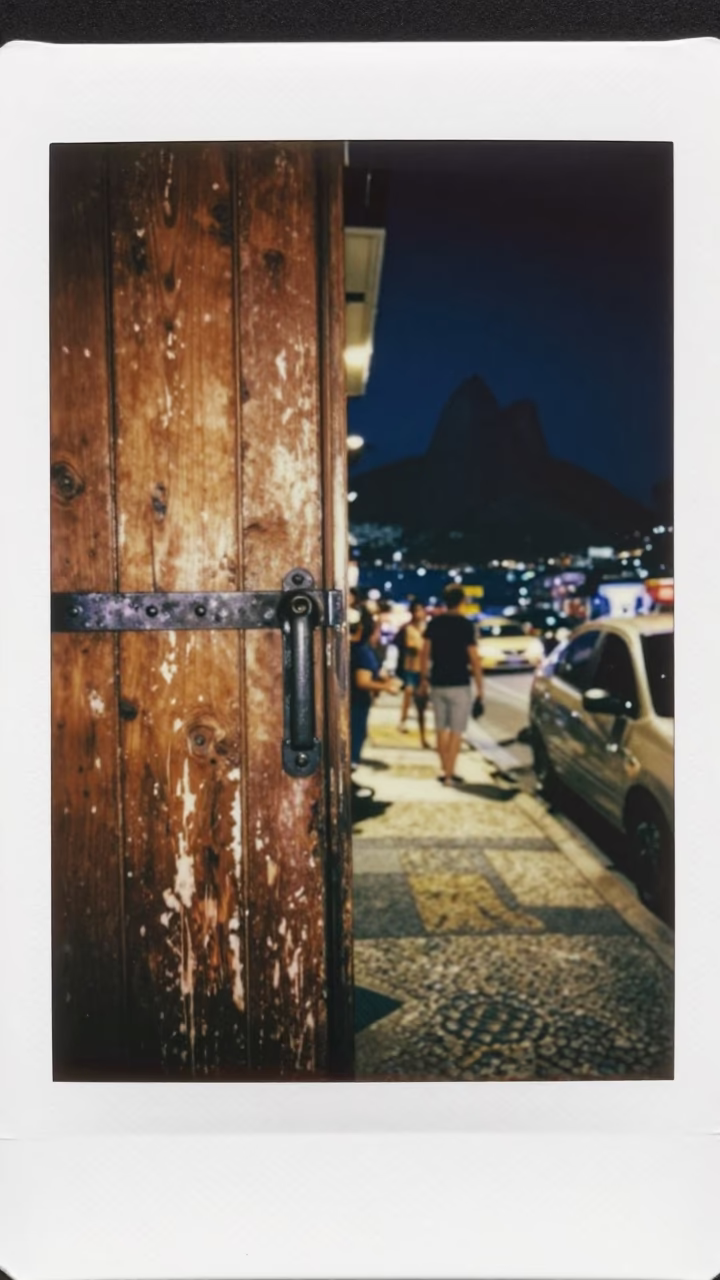 Late Night Rio Street Scene with Notebook and Deadbolt on Weathered Door in in Rio de Janeiro, Brazil