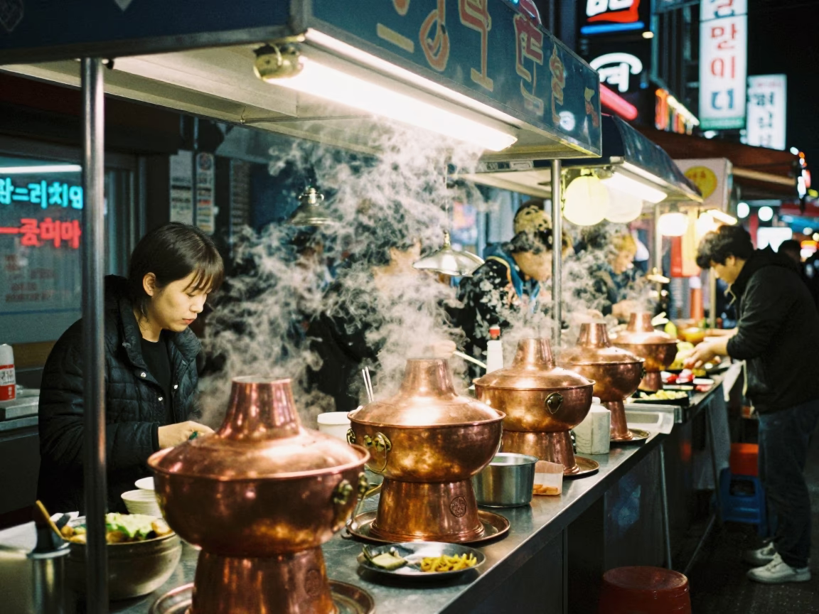 Late Night Seoul Street Food Stall with Copper Pots and Condiments in in Seoul, South Korea