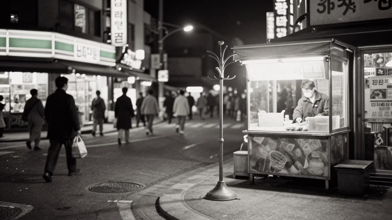 Late Night Seoul Street Scene with Vintage Coat Stand and Food Vendor in in Seoul, South Korea
