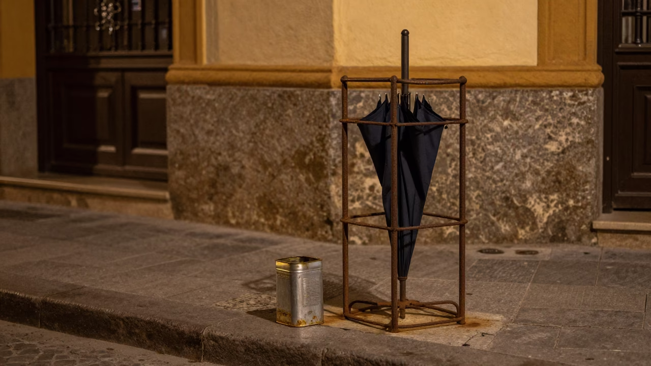 Late Night Seville Street Corner with Umbrella Stand and Coffee Tin in in Seville, Spain