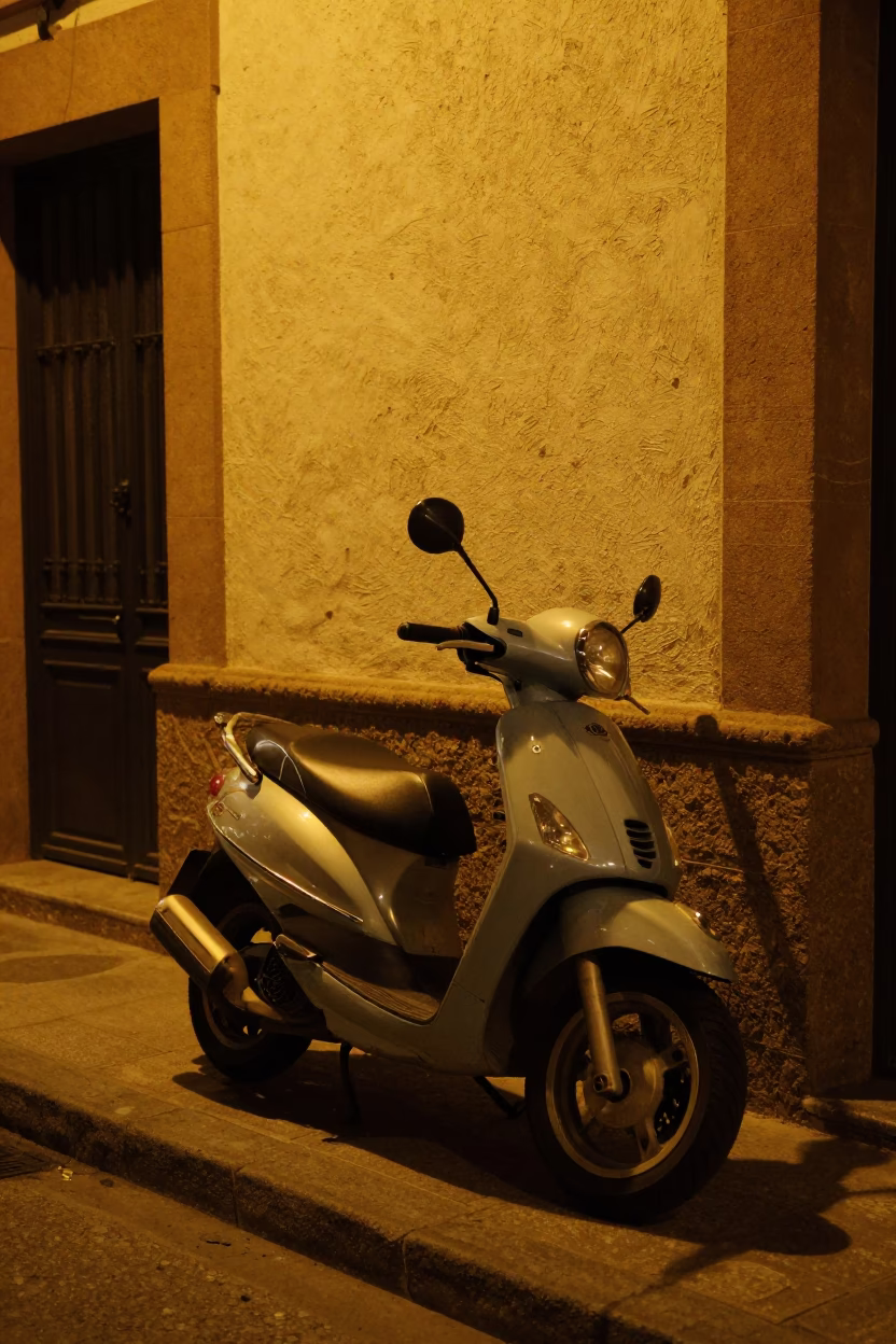 Late Night Seville Street Scene with Motorcycle and Urban Lighting in in Seville, Spain