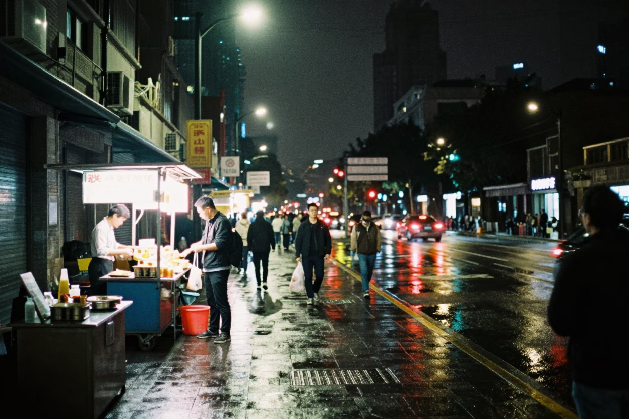 Late Night Shanghai Street Scene with Food Vendor and Neon Reflections in in Shanghai, China