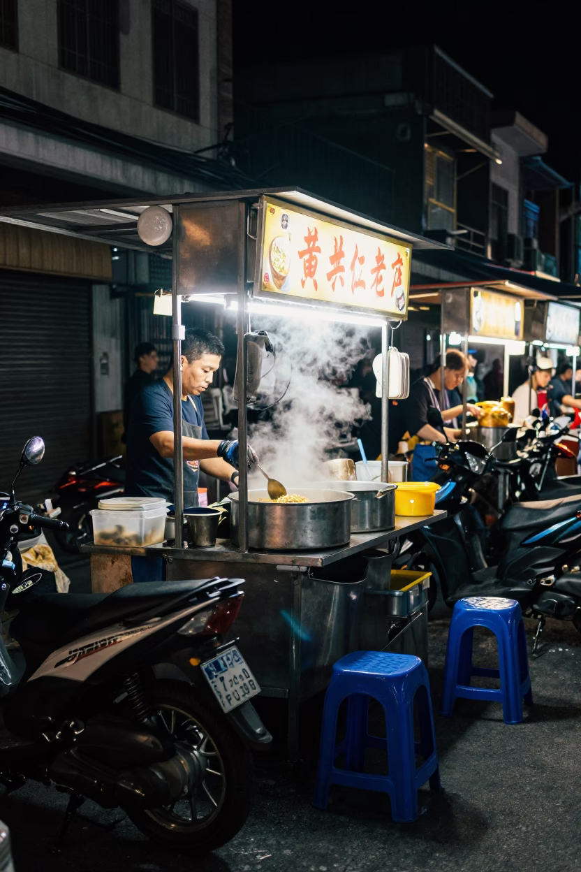Late Night Street Food Stall in Tainan Taiwan with Motorcycles and Neon Lights in in Tainan, Taiwan