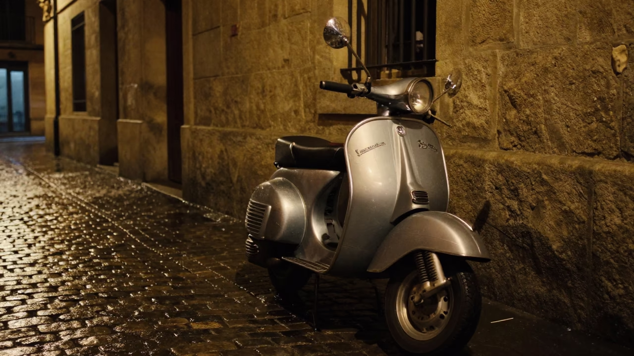 Late Night Street Scene in Bilbao Spain with Vintage Vespa on Cobblestone Lane in in Bilbao, Spain