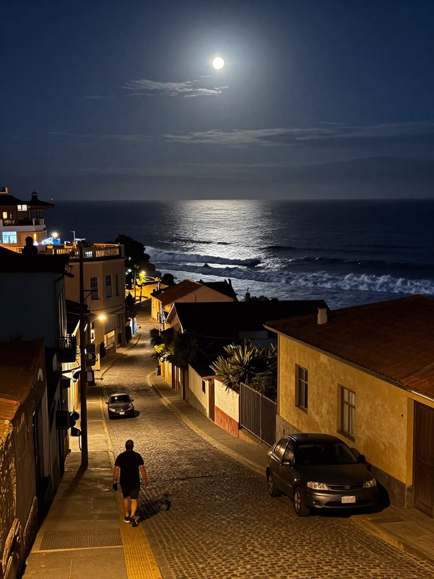 Late Night Street Scene in Valparaiso Chile with Moonlit Surf and Beacon in in Valparaiso, Chile