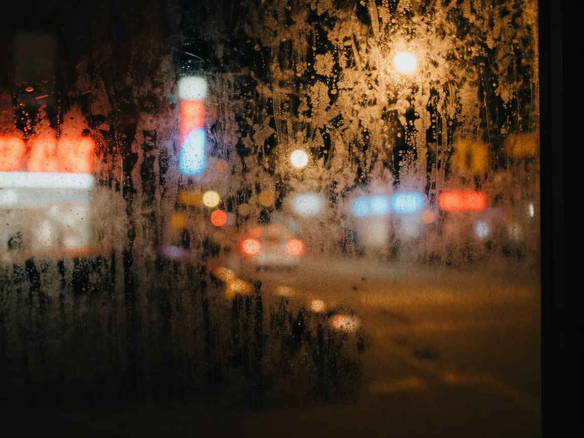 Late Night Toronto Street Scene with Condensation on Glass and Urban Reflections in in Toronto, Ontario, Canada