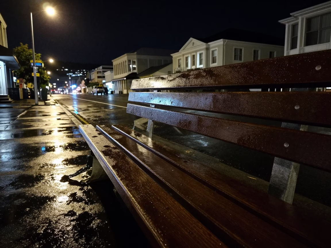 Late Night Wellington Street Scene with Condensation on Wet Bench Slats in in Wellington, New Zealand