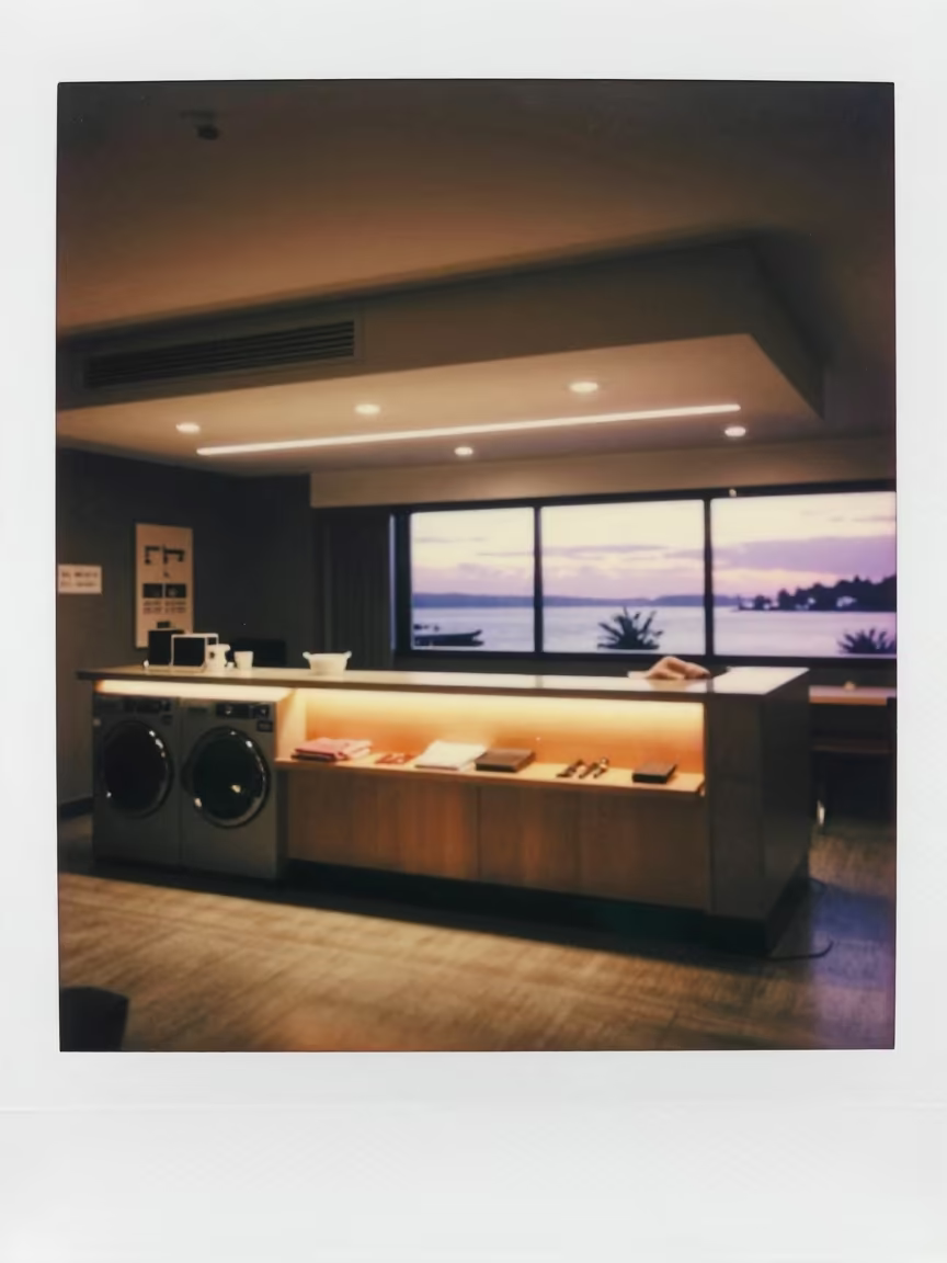 Laundry Folding Counter Under Neon Light in Aberdeen in at a reception desk under warm light in Aberdeen