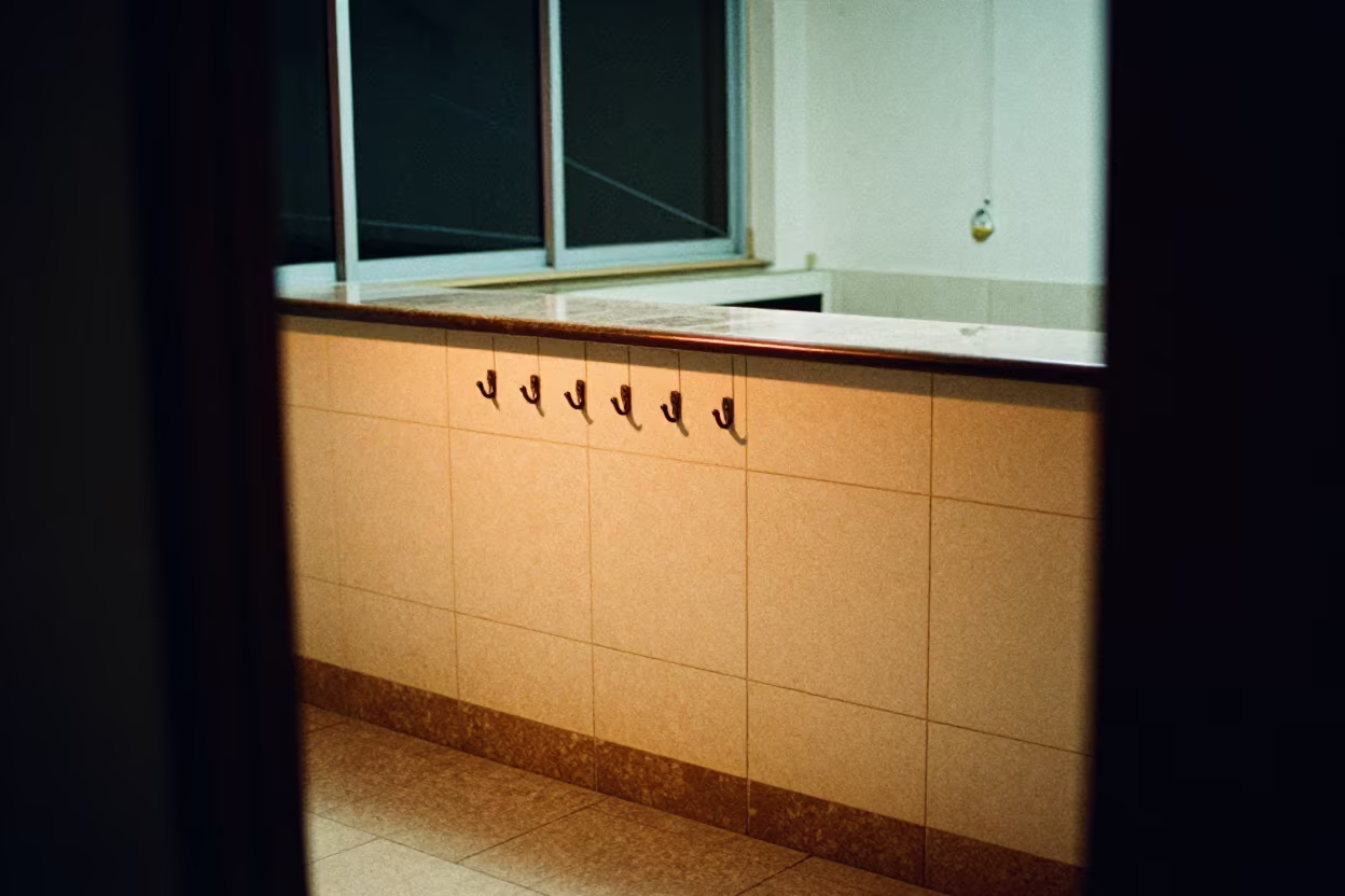 Laundry Pole Hook at Rio Reception Desk Night in at a reception desk under warm light in Santa Teresa, Rio de Janeiro