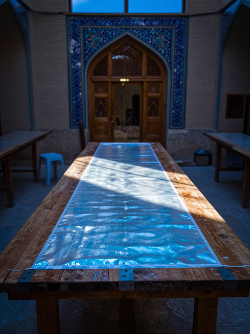 Lead Hem Weight on Atelier Table in Isfahan in inside a couture atelier in Isfahan