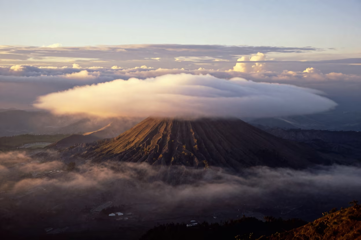 Lenticular Cloud Over Volcanic Peak Colombia in through low marine fog in Colombia