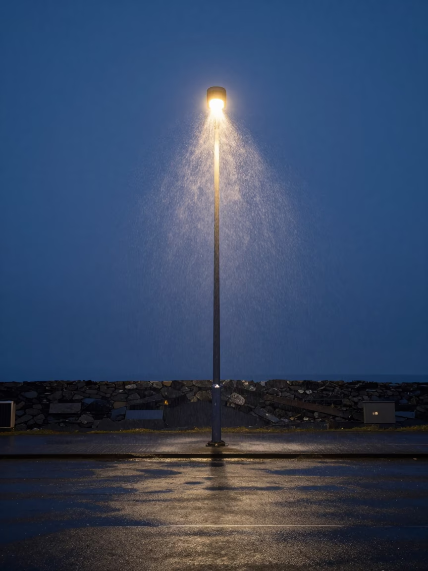 Light Pillar Rising from Streetlamp in Icelandic Dawn in in Iceland