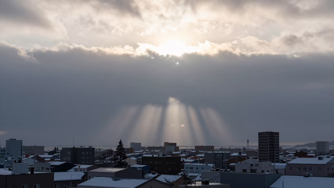 Light Pillars Rising Over Sapporo Thunderheads in over a horizon of stacked thunderheads near Sapporo