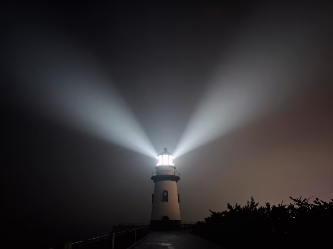 Lighthouse Beam Sweeping Through Fog at Night in near Nanning