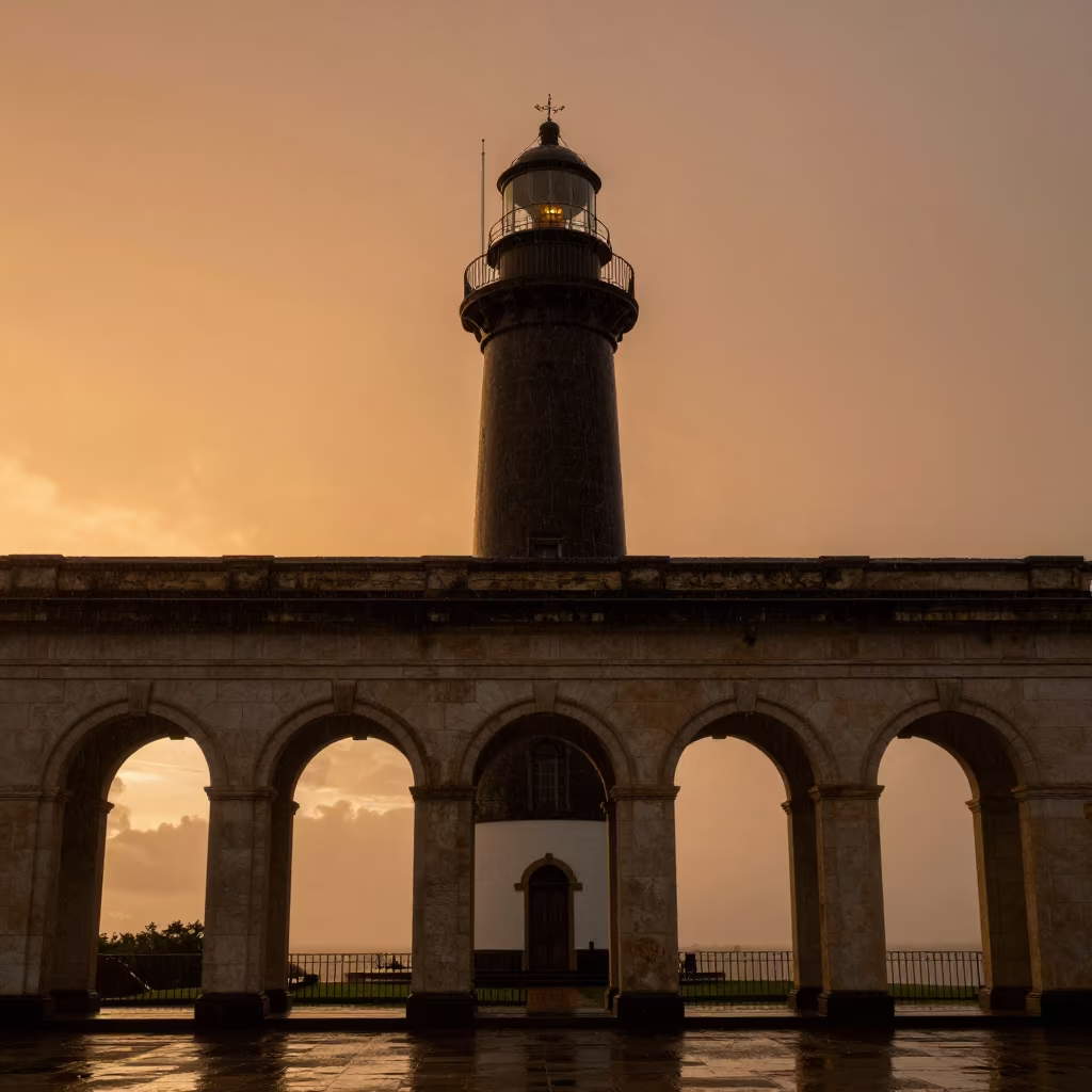 Lighthouse Silhouette Grenada Sunset Drizzle in along a colonnaded facade in Grenada