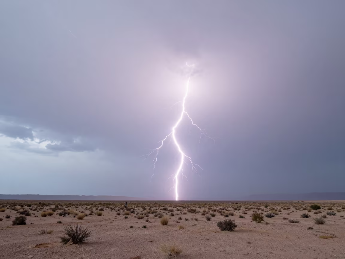 Lightning Forks Over New Mexico Mesa in through low marine fog in New Mexico