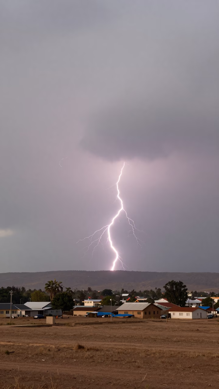 Lightning Over Sleeping City Jalingo Plain in across a storm-bright plain near Jalingo