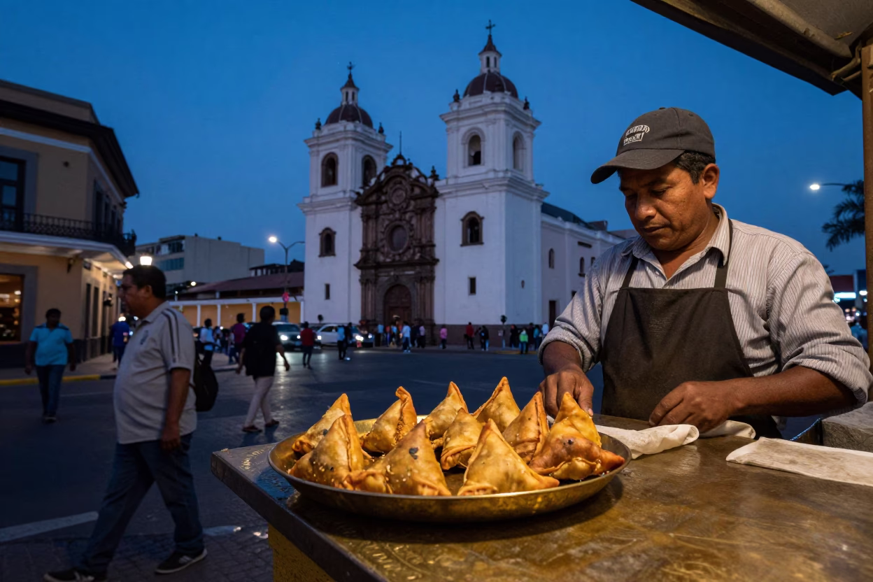 Lima Peru Indigo Twilight Street Scene with Brass Plate of Samosas in in Lima, Peru