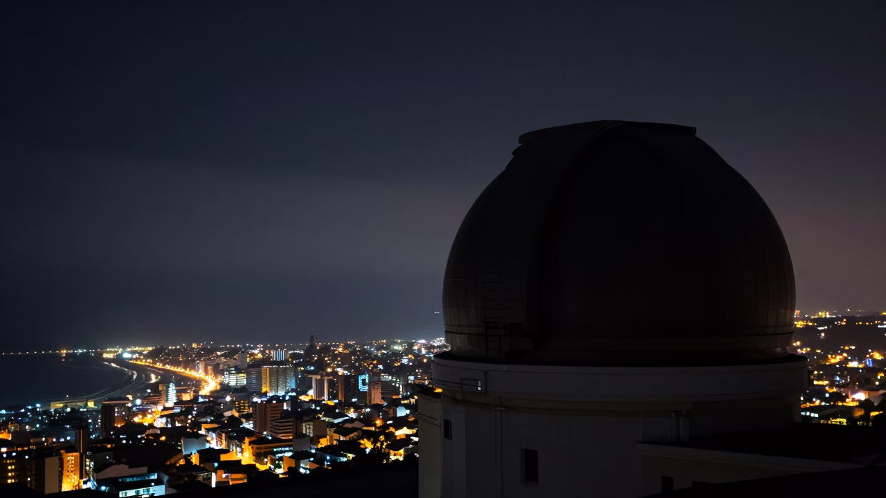 Lima Peru Night Sky Observatory Dome Silhouette Against Coastal City Lights Horizon in in Lima, Peru