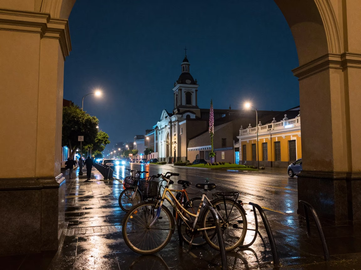 Lima Peru Night Street Scene with Foxglove Spire and Bicycle Rack Under Deep Sky in in Lima, Peru