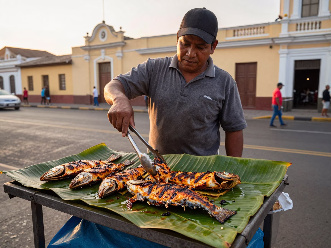 Lima Peru Street Vendor Selling Grilled Fish on Banana Leaf at Sunset in in Lima, Peru