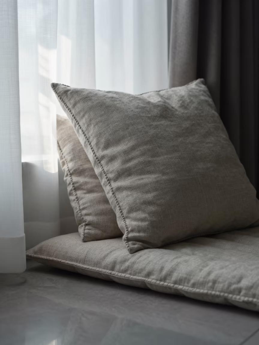 Linen Pillow Hand Stitched in Hefei Morning Light in on a reading nook cushion in Hefei