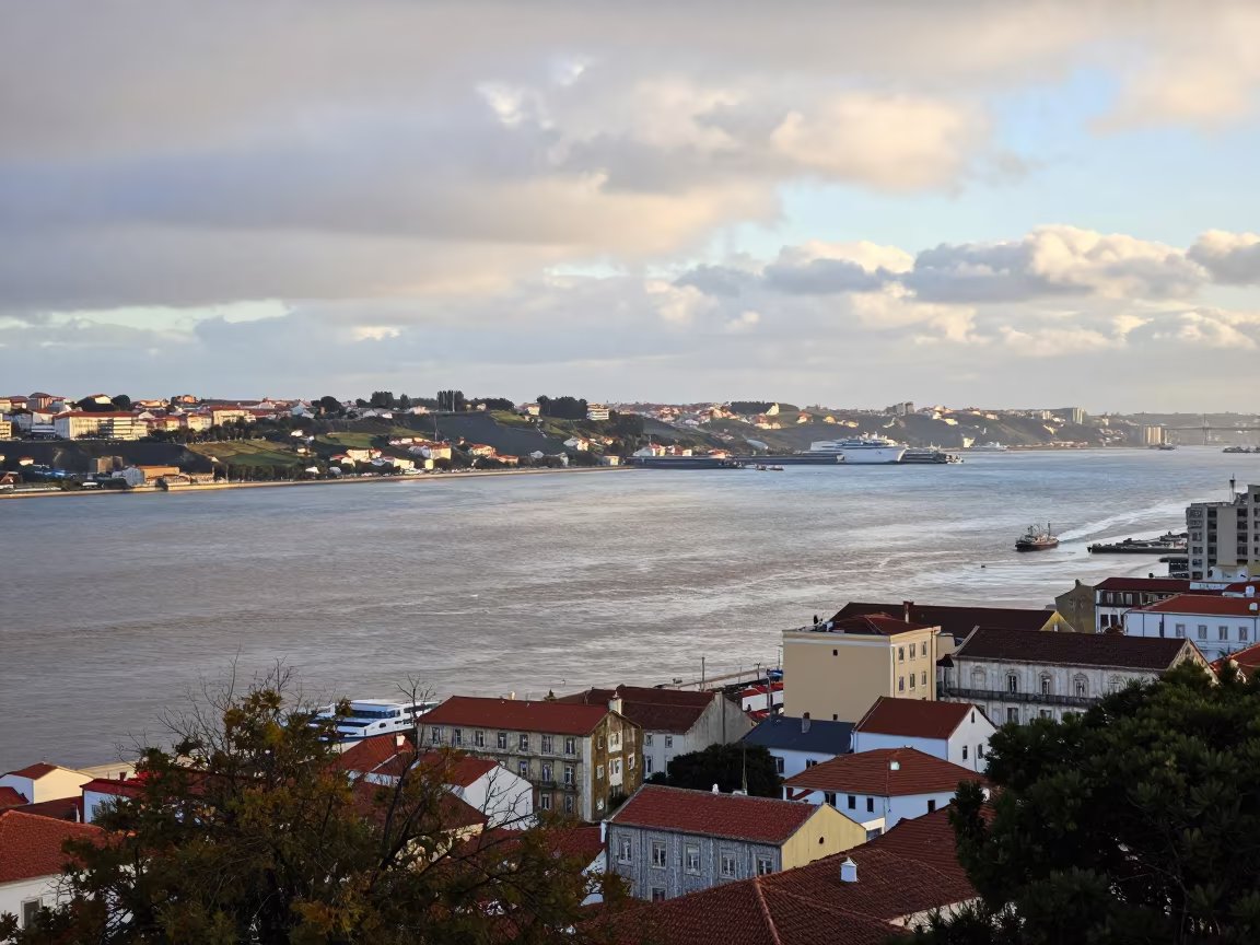 Lisbon Estuary Sunrise Over Alfama Hills in from a ridge above layered foothills near Alfama, Lisbon