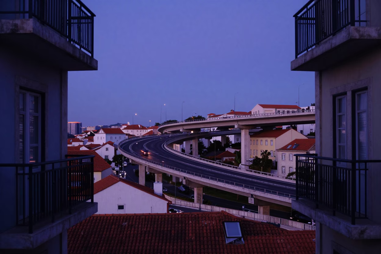 Lisbon Evening View from Apartment Balcony with Overpass Ramp and Potted Succulents in in Lisbon, Portugal